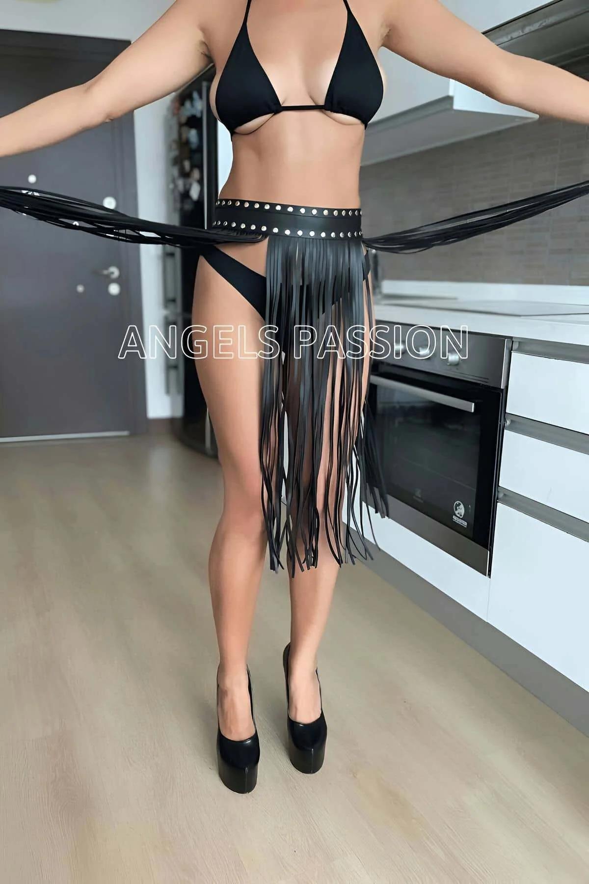 Fringe Skirt: Studded Faux Leather Tassel Mini Skirt