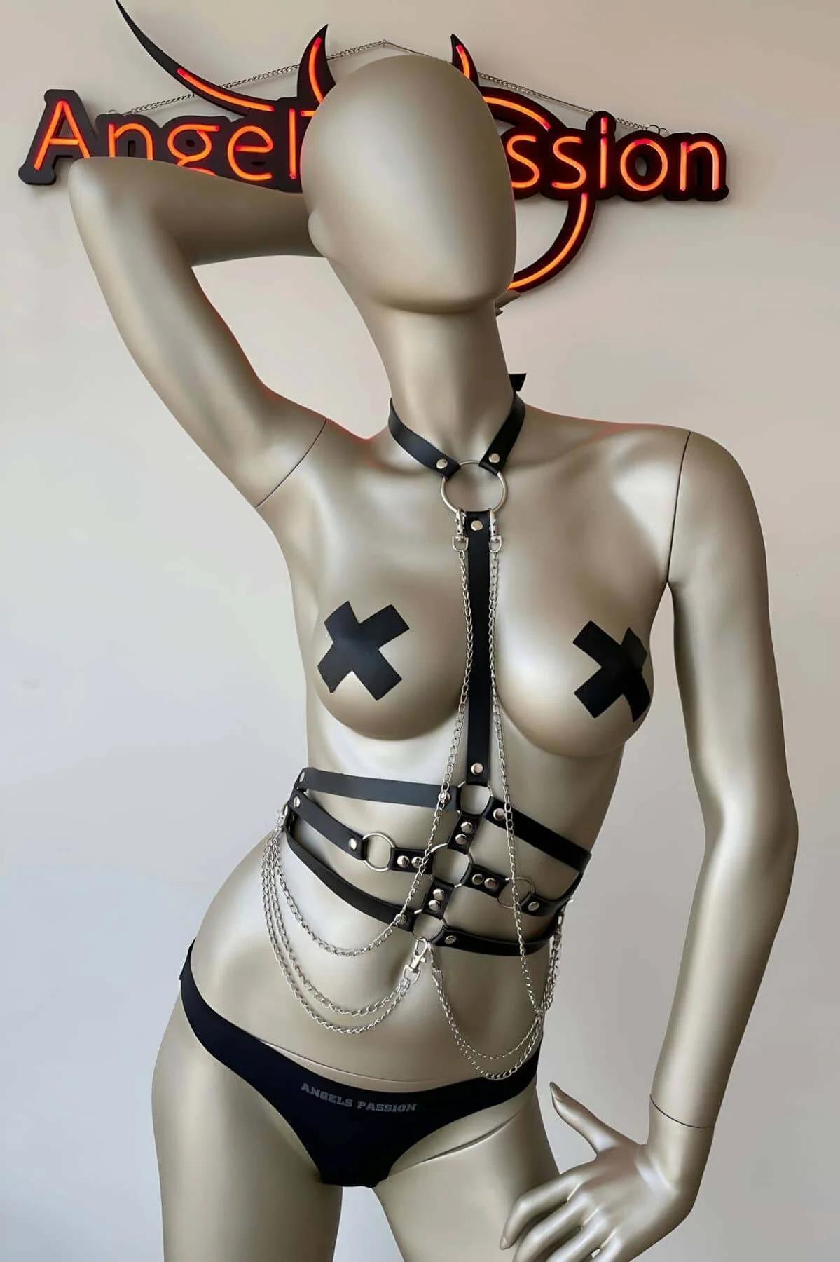 adjustable metal pin buckles on black faux leather body harness strap
