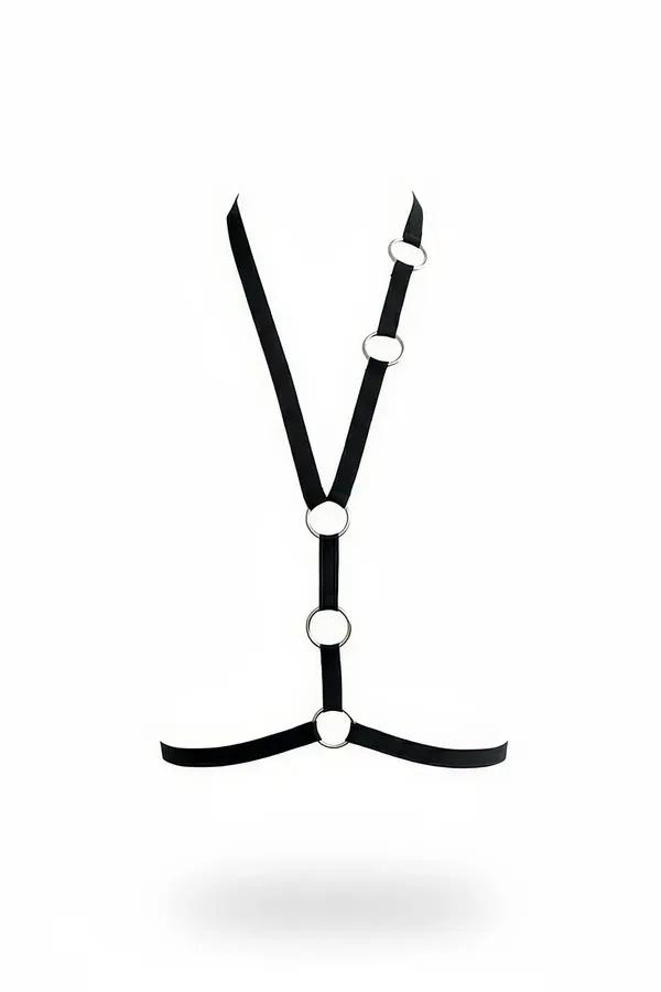 Black vegan leather Y-shape body harness with five silver O-rings and asymmetrical waist strap detail on white background