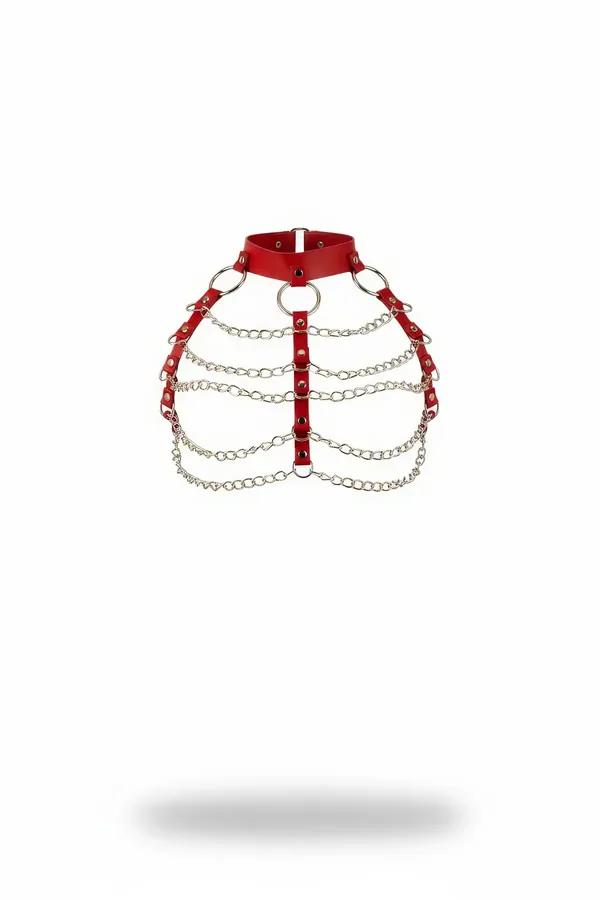 Red faux leather choker chest harness with four rows of silver link chains and O-ring hardware on white background