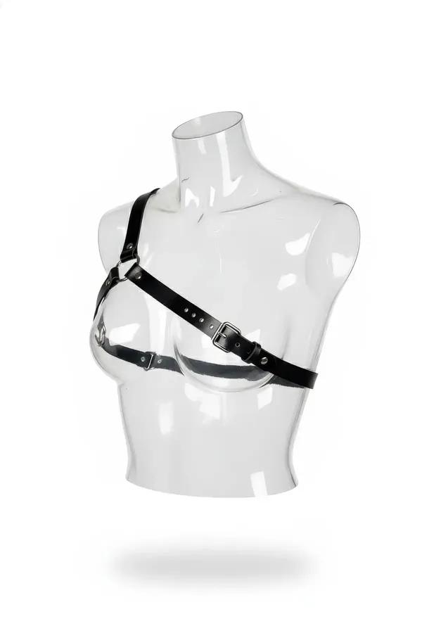 Black faux leather asymmetric chest harness with diagonal cross strap silver O-ring and two adjustable buckles on mannequin