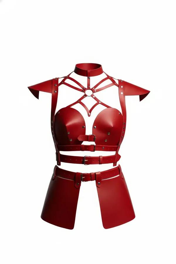 Red faux leather bustier harness set with molded cups, O-ring web straps, shoulder caps, and matching wrap skirt panels