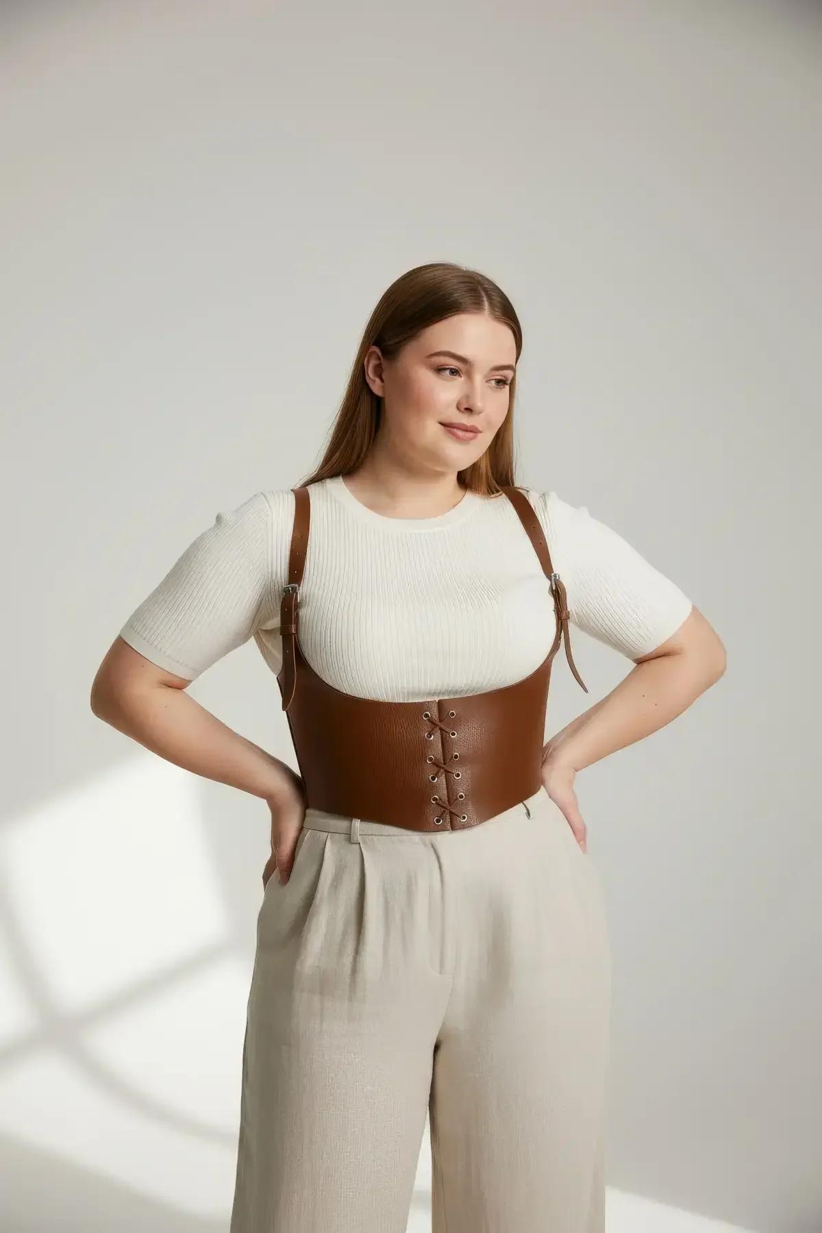 Front lace-up closure detail on brown faux leather underbust corset harness