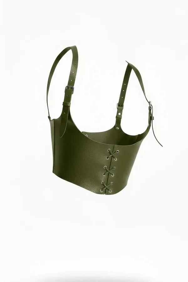Olive faux leather corset harness top with metal-eyelet lace-up front panel and adjustable silver-tone buckle shoulder straps