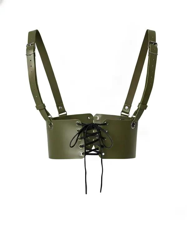 Olive faux leather underbust harness with black lace-up front detail and silver grommets on white background