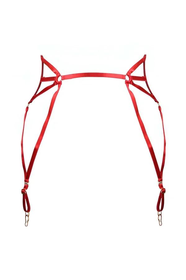 Red strappy garter harness with gold-tone O-ring chest detail and four lobster-claw stocking clips
