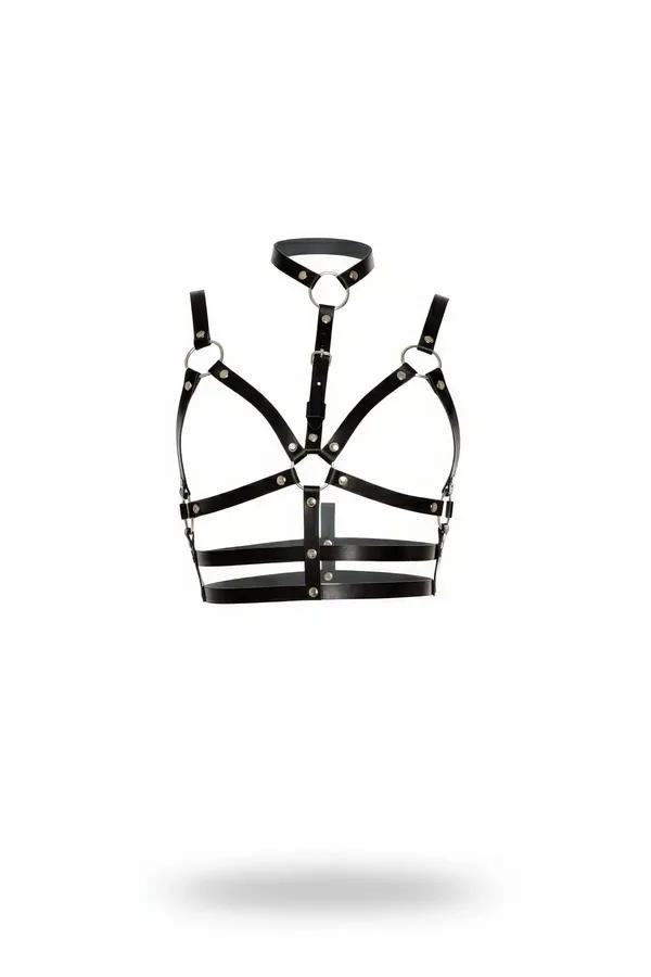 black faux leather cage bra harness with integrated choker and four silver O-rings against white background