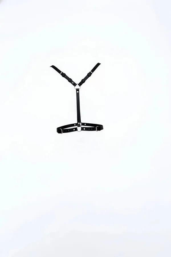 Black faux leather Y-shape chest and underbust harness with silver O-ring detail and adjustable buckles