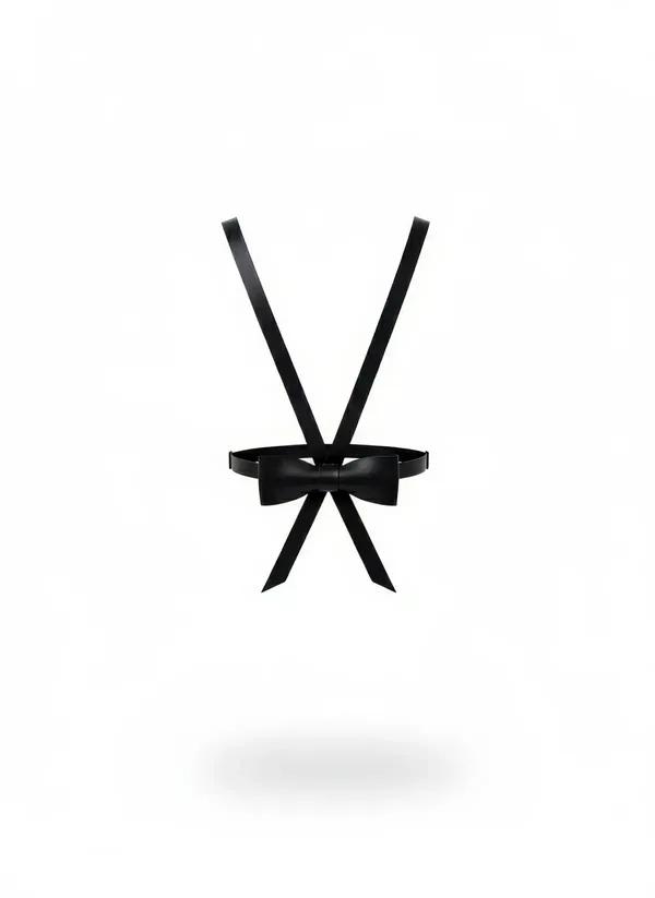 black vegan leather bow tie waist and shoulder harness with crossed front straps on white background