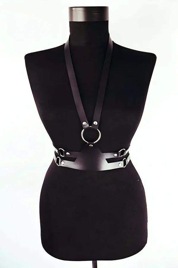 Black faux leather body harness with silver O-ring chest detail and wide adjustable waist belt on dress form