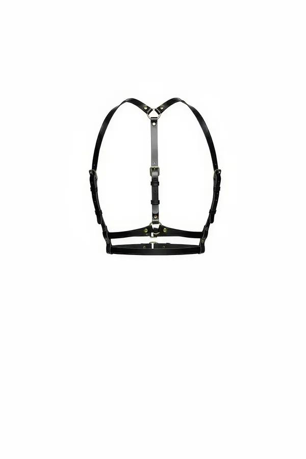 black faux leather chest body harness with Y-back adjustable shoulder straps and silver-tone buckle hardware, white backgroun