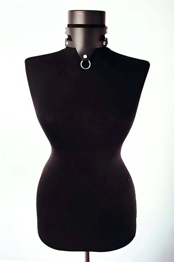 black vegan leather choker with silver O-ring and rivet detail neck band on model