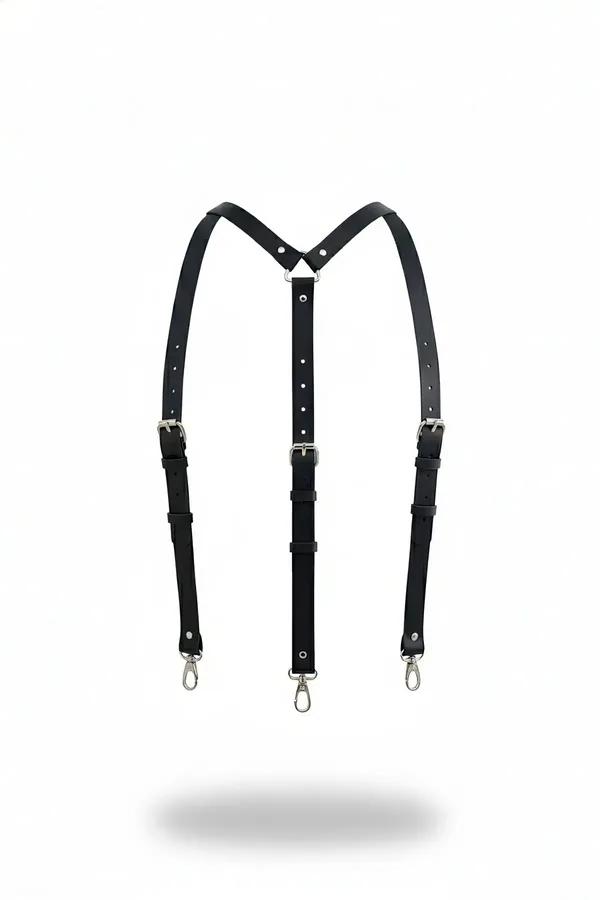 black faux leather Y-back harness with silver swivel lobster clasps and adjustable buckles on white background