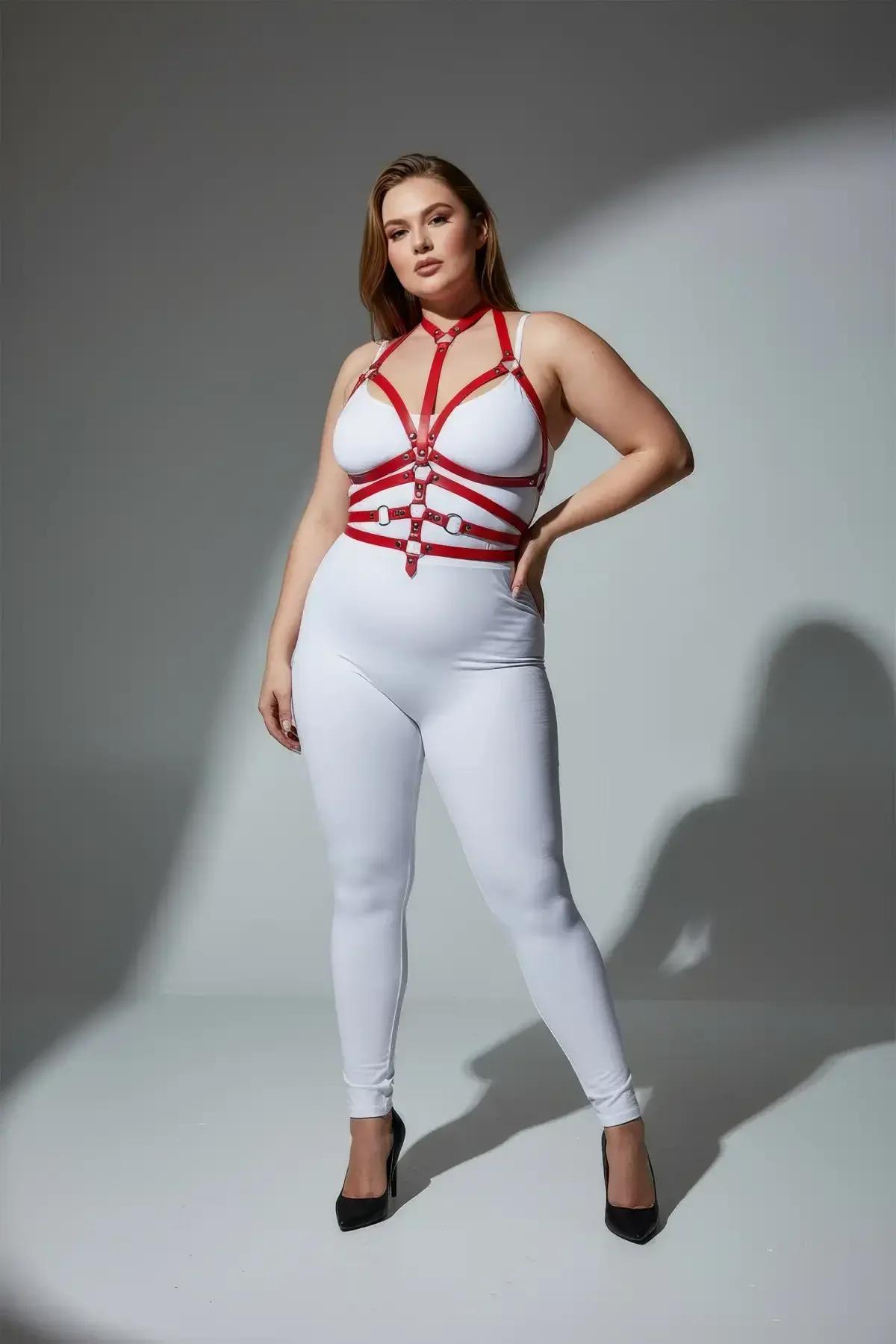 Five horizontal red vegan leather waist cage straps with silver chrome O-rings at side junctions