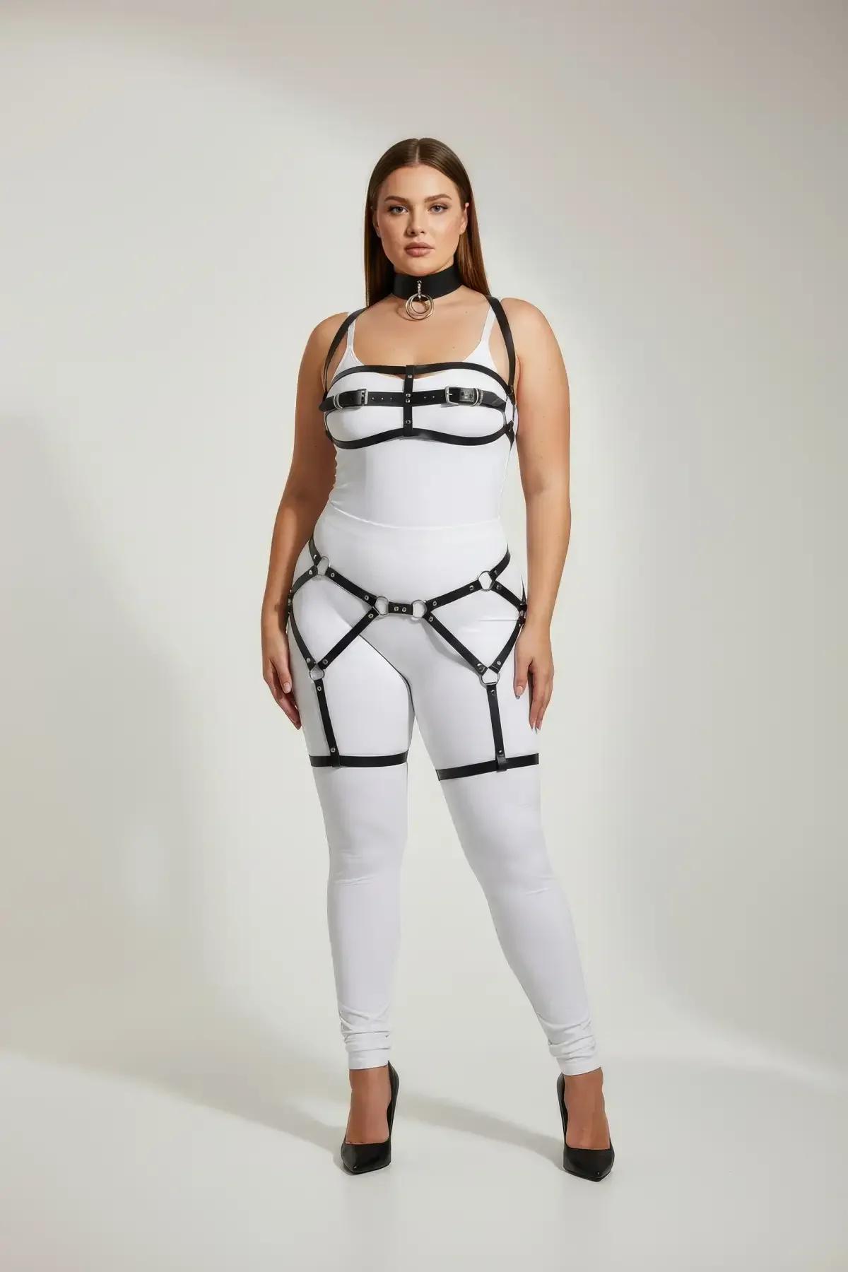 Black faux leather garter harness set with silver O-rings, chest bra, waist-thigh garter, and choker on model