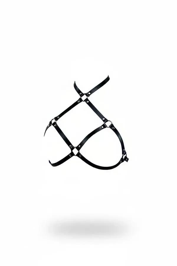 Black faux leather men's chest harness with silver O-rings and rectangular cage strap panel on white background