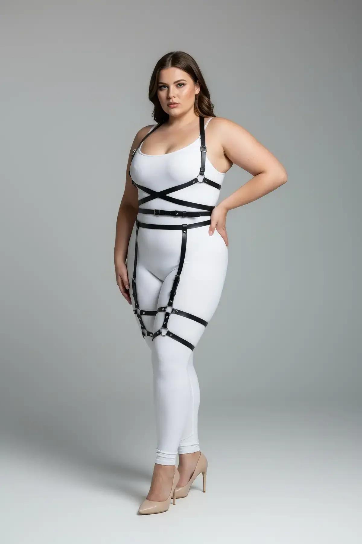 Black vegan leather body harness showing adjustable waist belt and garter drop straps detail