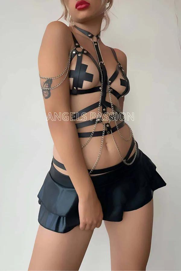 black faux leather full body harness with silver chain drapes and cross chest panel front view