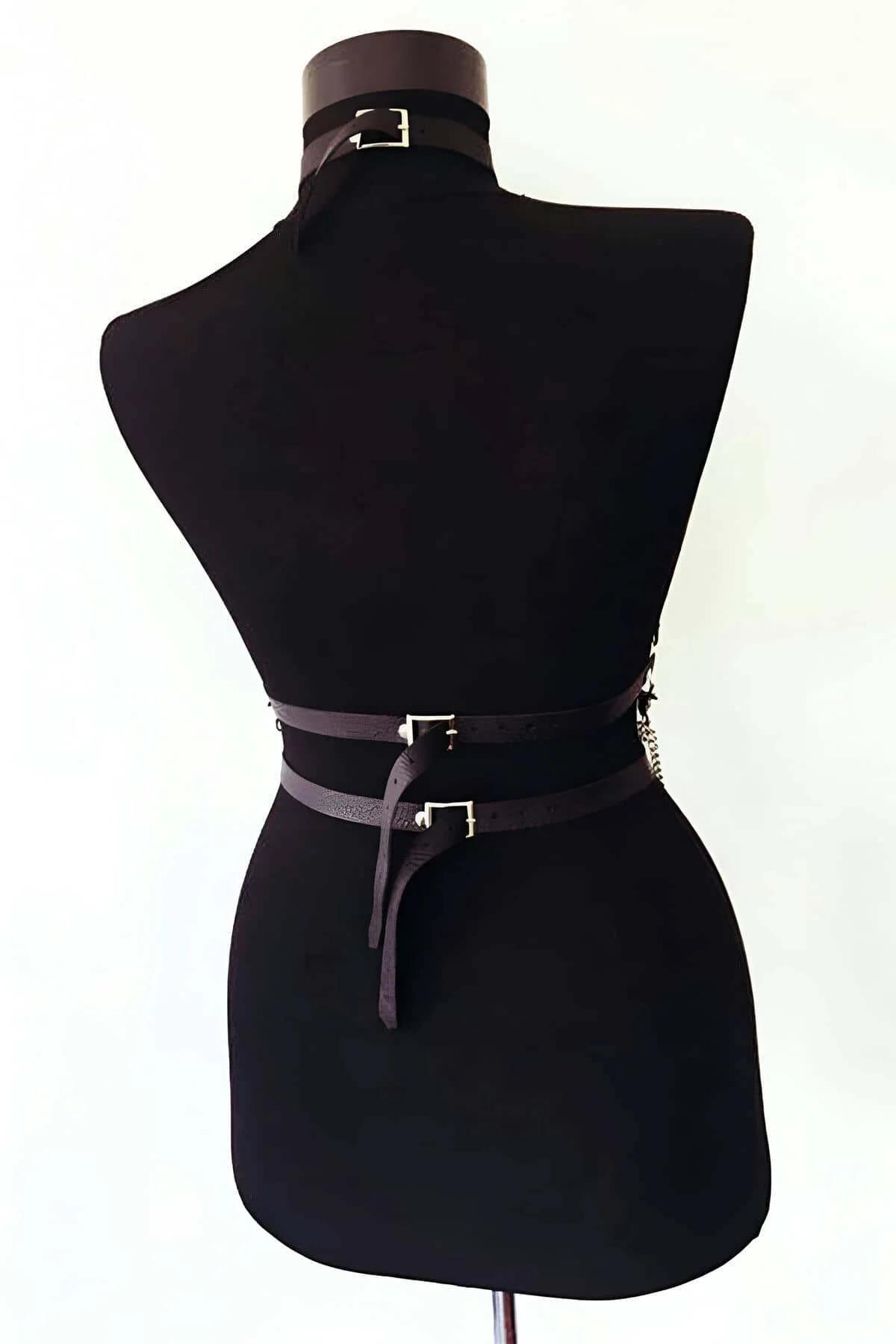 black chest harness waist band with central silver O-ring front detail