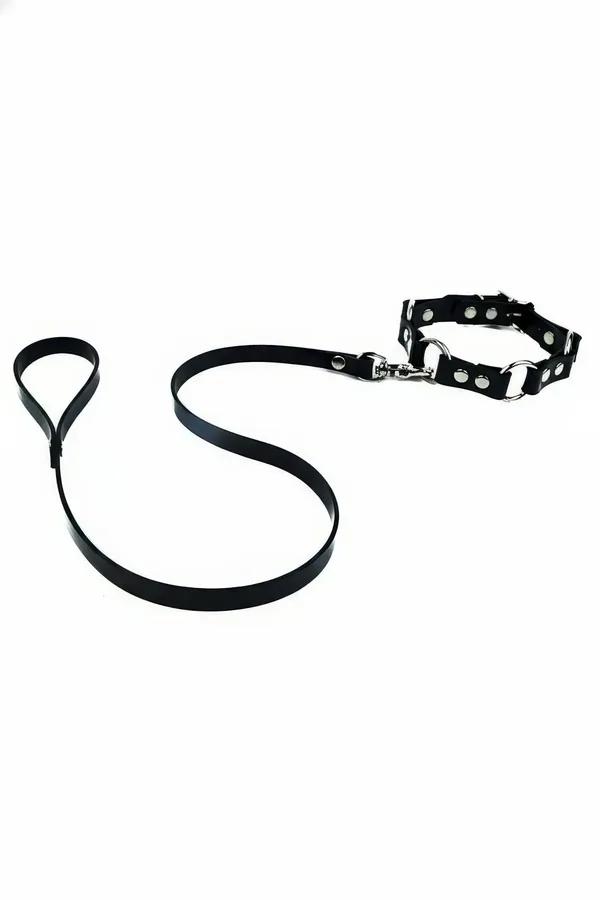 black faux leather studded choker with silver D-ring and detachable long leash on white background