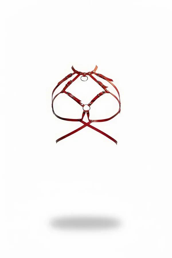 Red faux leather cage chest harness with two silver O-rings and stud rivets, triangular crisscross strap panel