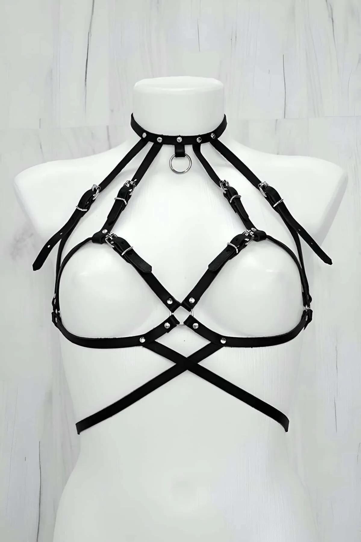 black faux leather caged chest harness with silver O-ring choker and X-cross strap design on white mannequin