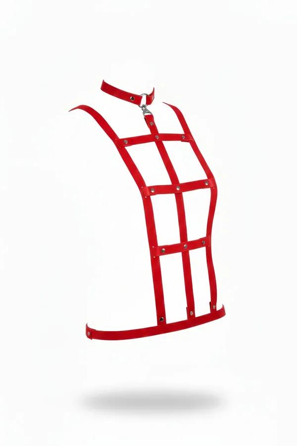 Red faux leather cage body harness with integrated choker, silver O-ring hardware, and rivet-studded grid strap panel