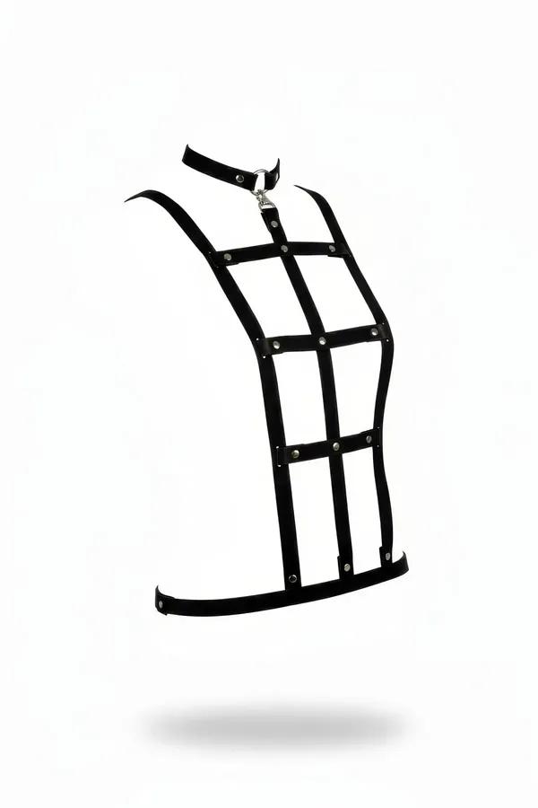 Black faux leather cage body harness with silver dome studs and O-ring choker collar, full-torso grid panel view