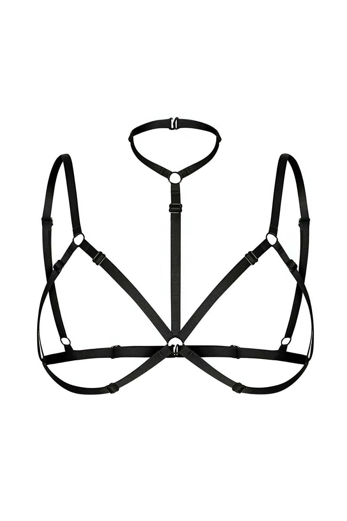 Close-up of silver-tone O-ring junction on black elastic chest harness showing three converging straps