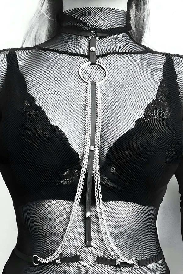black faux leather chest harness silver chain O-ring front view on model with bralette