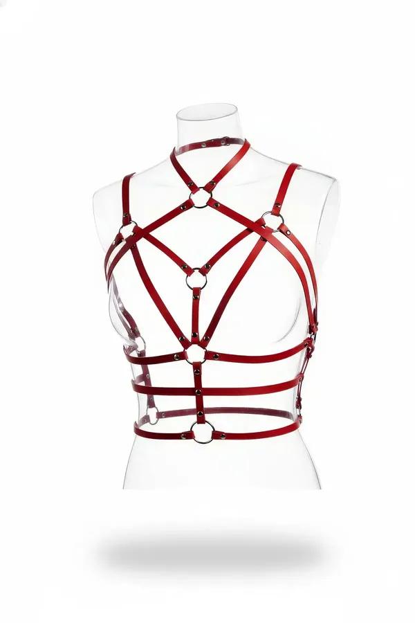 Red vegan leather caged body harness with integrated choker and seven bronze O-rings on mannequin front view