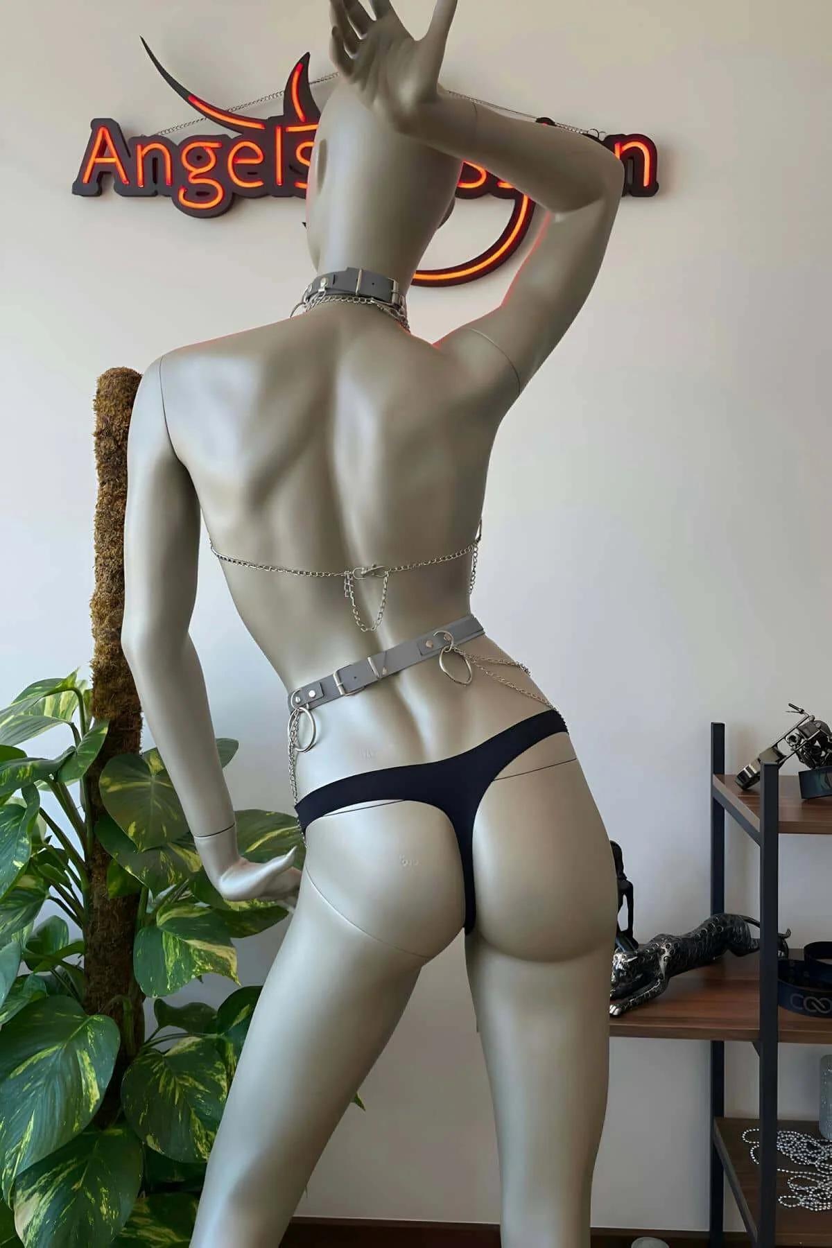 White reflective waist belt with O-rings and cascading silver-tone chains detail