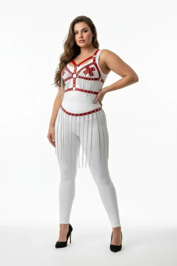 white faux leather body harness with red accent straps silver O-ring hardware and chain fringe skirt worn over white leggings