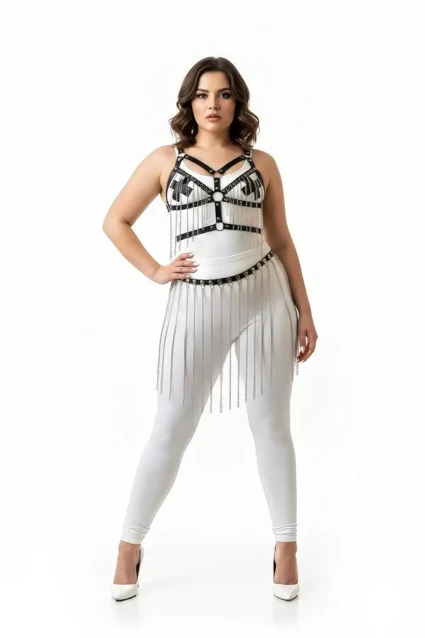 Black faux leather body harness with silver O-rings and cascading silver fringe chain skirt overlay worn over white leggings