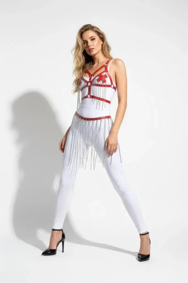 Red faux leather chest harness and chain fringe waist skirt set with silver O-ring hardware, worn over white leggings