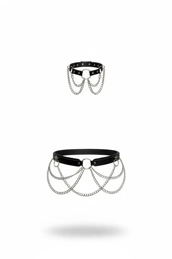 Black faux leather waist harness with cascading silver chains and three silver O-rings draping across front panel