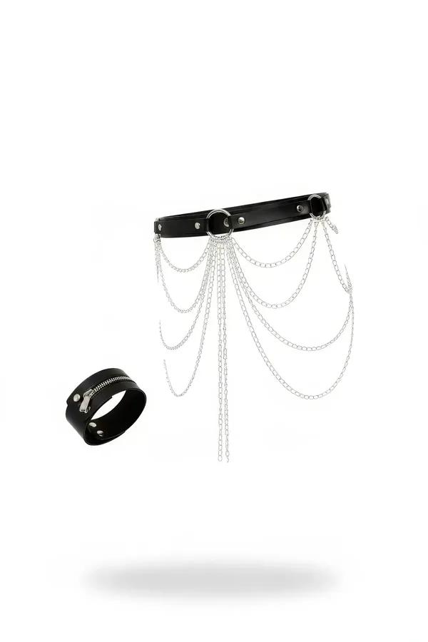 Black faux leather multi-layered chain waist belt with asymmetric silver drape chains and matching zip-closure cuff bracelet