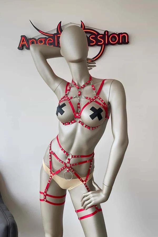 Red faux leather body harness set with silver O-rings and studs, cage waist section, chest harness collar, and thigh garter s