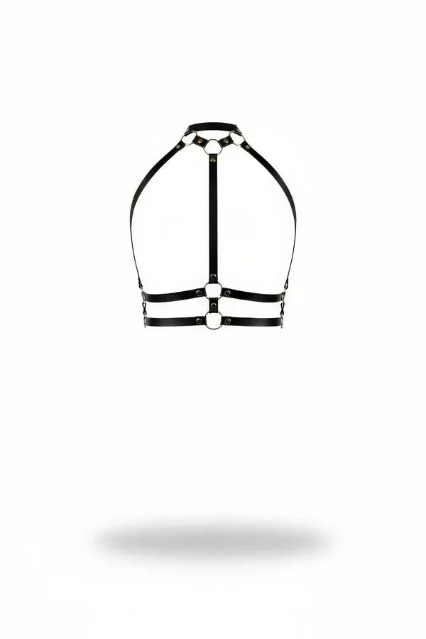 Black faux leather halter neck chest harness with chrome O-rings and dual underbust straps on white background