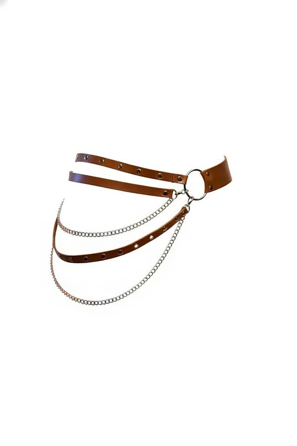 Cognac faux leather waist harness with dual grommet straps, central silver O-ring, and three draped silver link chains