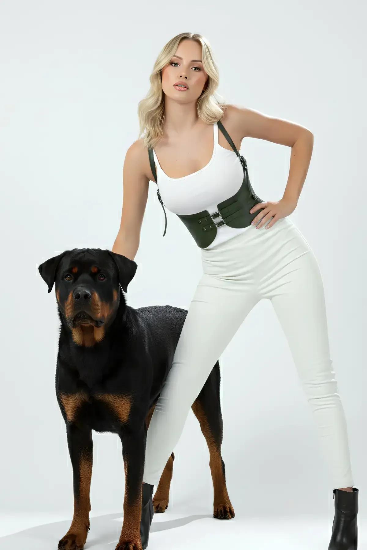 Side view of olive green underbust cincher showing curved panel shape and adjustable shoulder straps