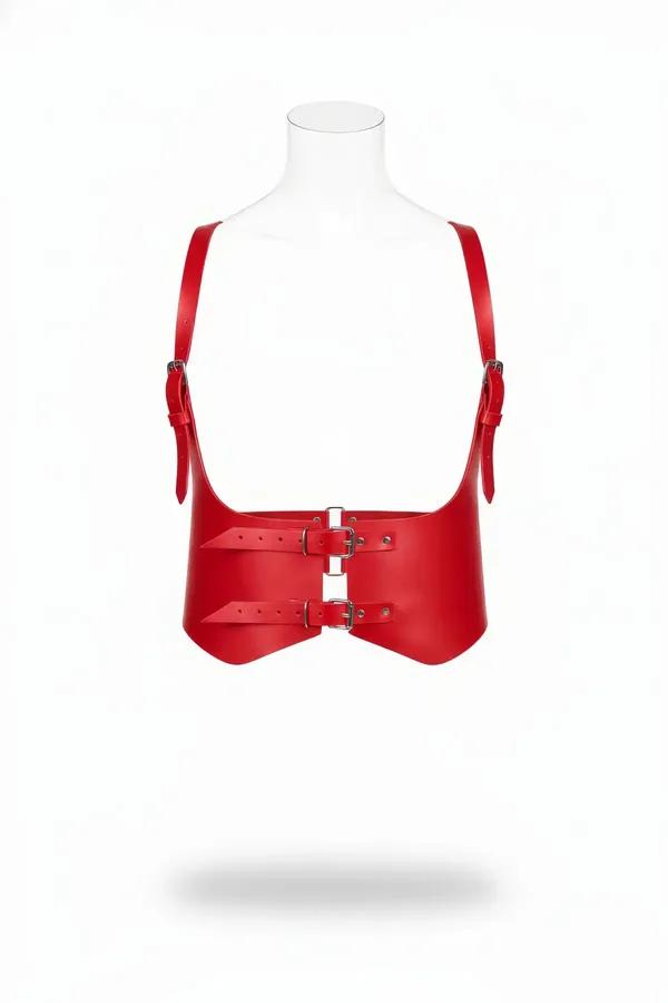 Red faux leather waist shaping harness with dual silver buckles and adjustable shoulder straps on mannequin