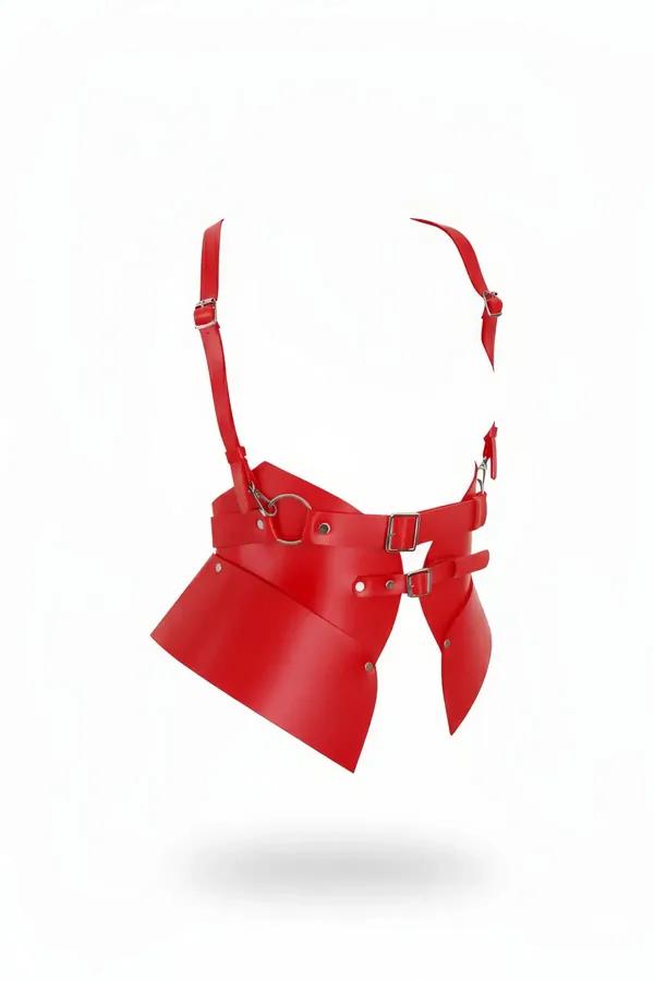 Red faux leather waspie waist harness with silver O-ring buckles and two asymmetric skirt panels on white background