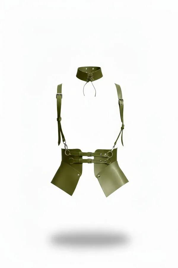 Olive faux leather corset harness with angled hip panels, double-strap waist band, silver O-ring hardware, and matching lace-