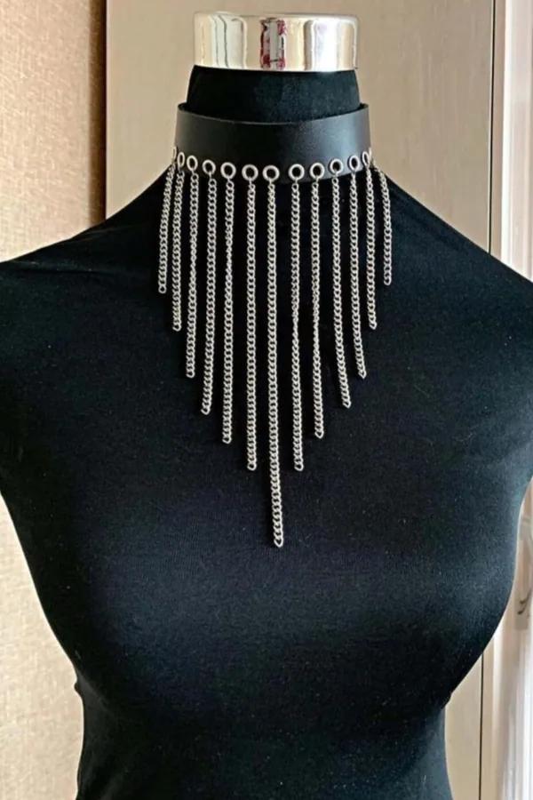 Black faux leather choker necklace with silver O-ring row and cascading waterfall curb-link chain fringe in V shape