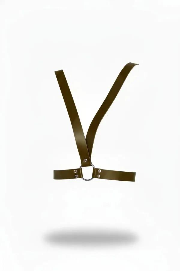 Olive faux leather shoulder harness with Y-strap silhouette and centered silver O-ring, silver rivet hardware, white backgrou