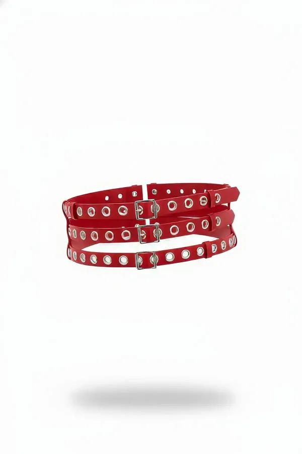 Red triple strap garter belt with silver eyelets and individual square buckles on glossy faux leather bands