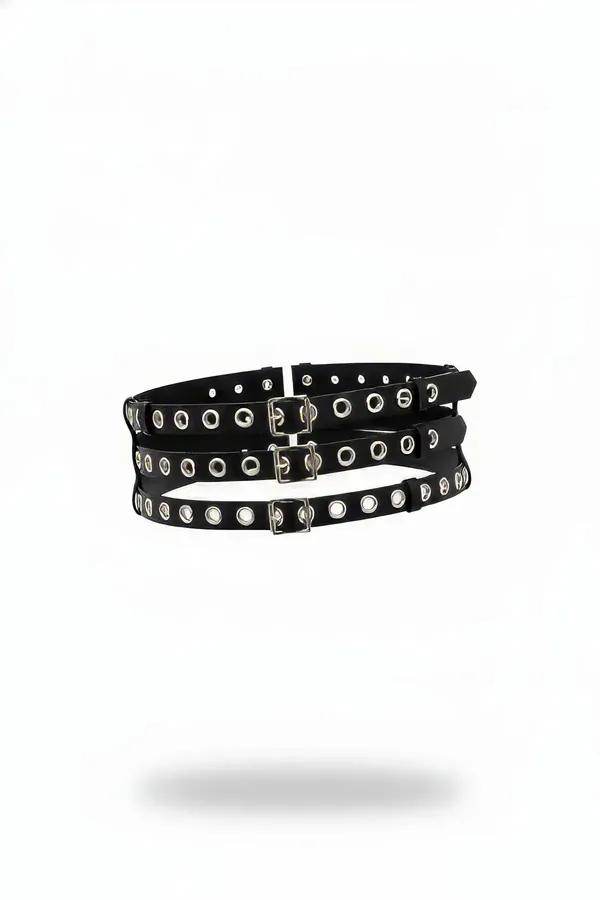 Black faux leather triple-strap eyelet waist harness belt with silver buckles and continuous eyelet detail