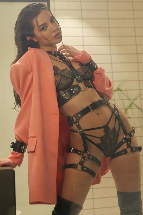 black faux leather caged body harness set with dual thigh strap frames and silver D-ring buckle hardware