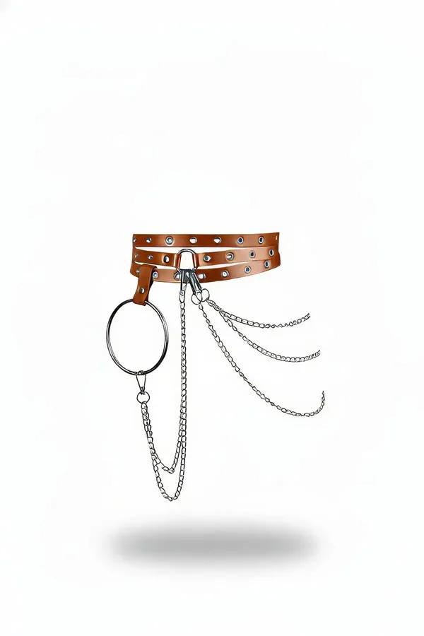 tan faux leather triple strap waist harness with silver eyelet studs, large O-ring, and cascading chain drape